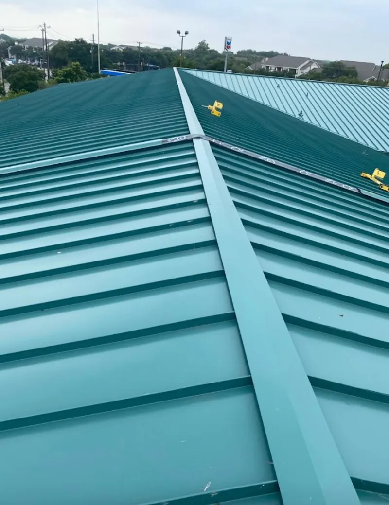 Green commercial metal roof ridge and valley for Metal Roof Repair in Broadalbin
